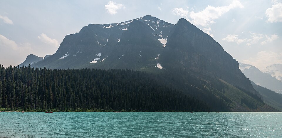 Fairview Mountain across Lake Louise with wildfire smoke haze, Banff National Park, Alberta, Canada