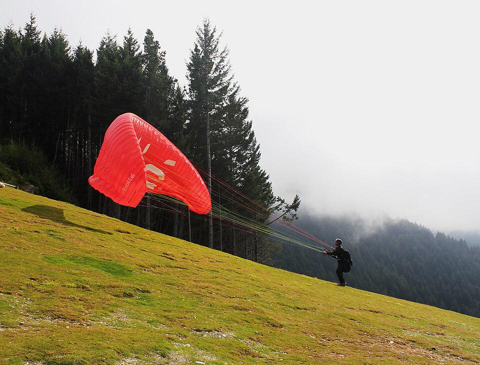Paraglider prepares for take off, Queenstown