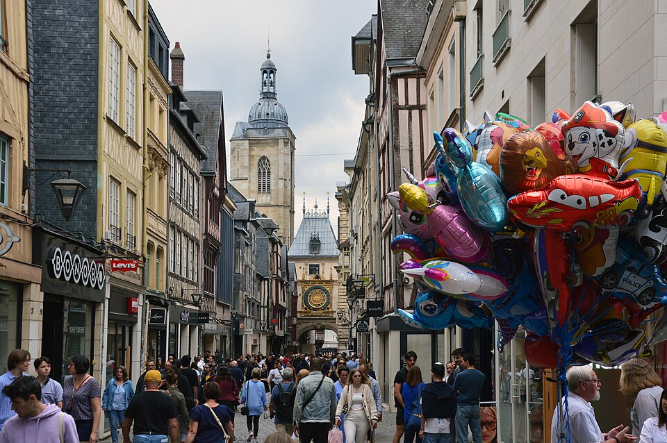 Looking down Rue du Gros Horloge, with balloons, Rouen, 2024